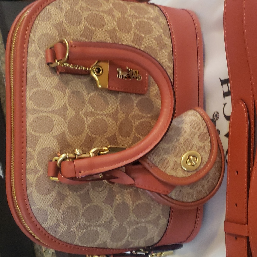 Coach Revel bag in signature coated canvas..